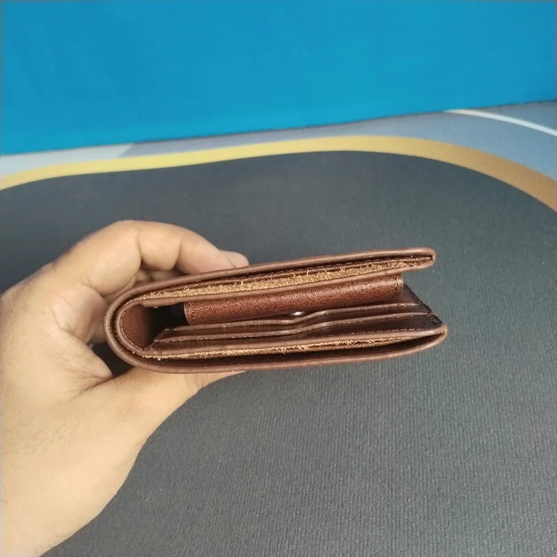 Elegant brown color pure leather bi-fold wallet